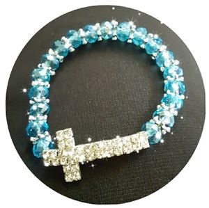 A winter themed cross bracelet